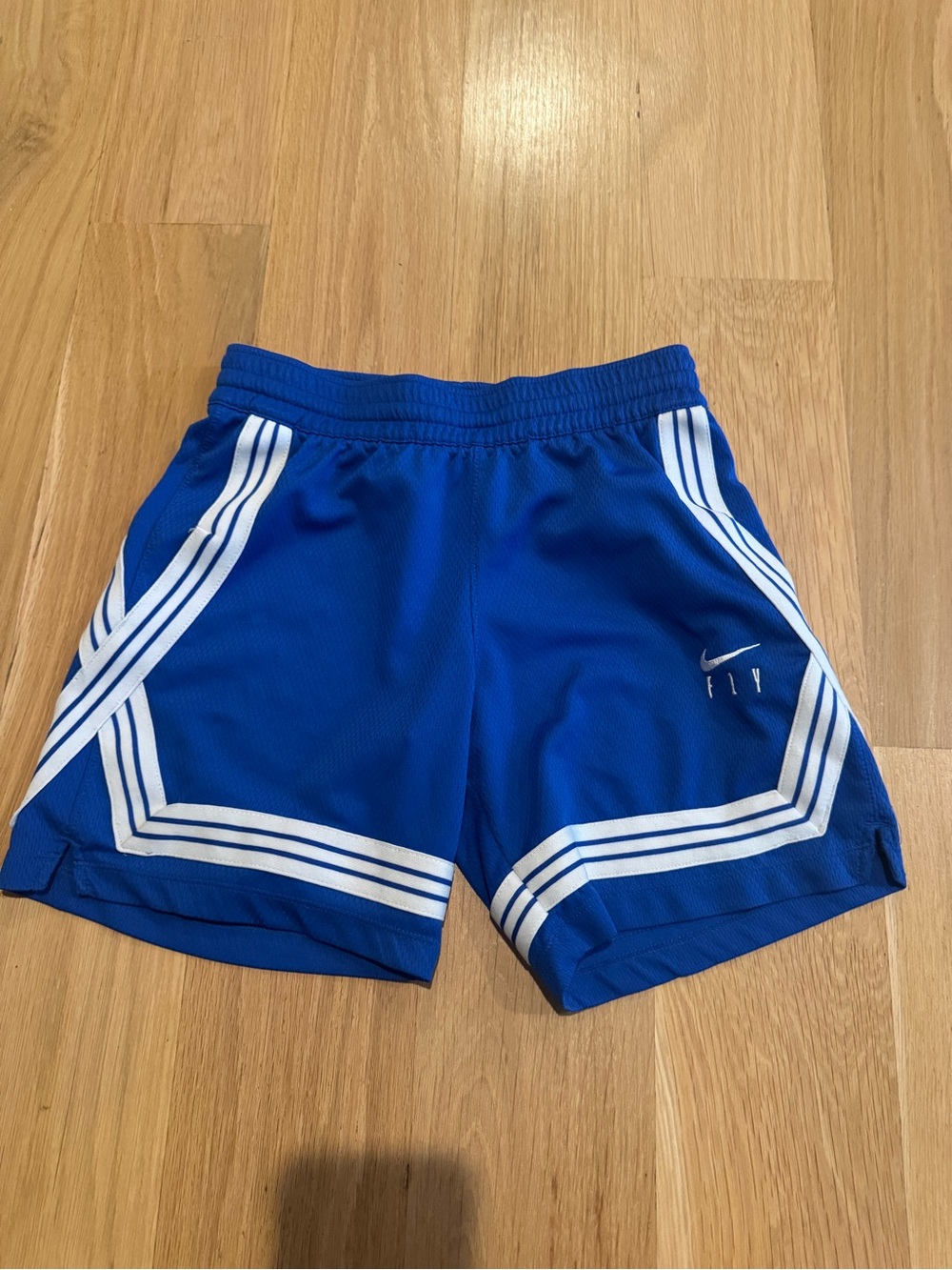 Nike Royal Blue Kids Athletic Shorts with White Stripes